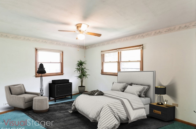 5341 Grand Ave, Downers Grove, IL 60515 - carpeted bedroom with baseboards and ceiling fan