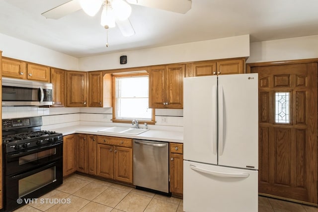 5341 Grand Ave, Downers Grove, IL 60515 - kitchen with stainless steel appliances, light tile patterned flooring, brown cabinets, tasteful backsplash, and ceiling fan