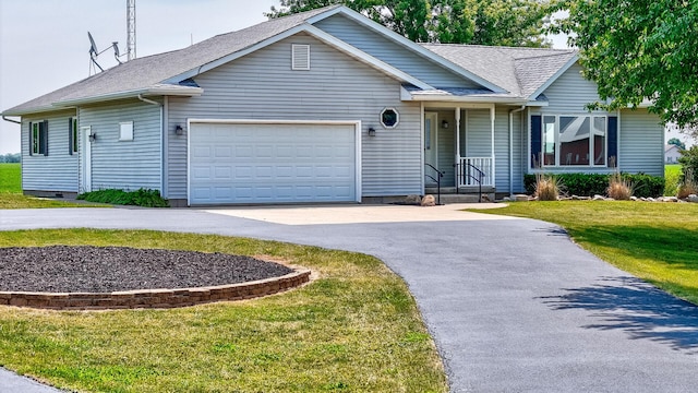 3472 N Il St Unit 23, Ottawa, IL 61350 - single story home with driveway, an attached garage, a front lawn, and roof with shingles