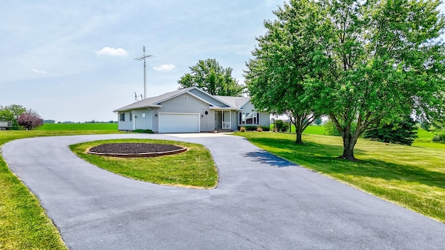 3472 N Il St Unit 23, Ottawa, IL 61350 - single story home with asphalt driveway, a garage, and a front yard