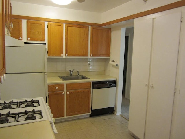 1769 Sessions Walk Unit C, Hoffman Estates, IL 60169 - kitchen with dishwashing machine, freestanding refrigerator, light countertops, tasteful backsplash, and range