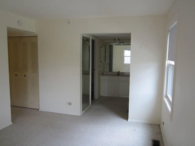 1769 Sessions Walk Unit C, Hoffman Estates, IL 60169 - unfurnished bedroom with carpet flooring, a closet, and ensuite bathroom