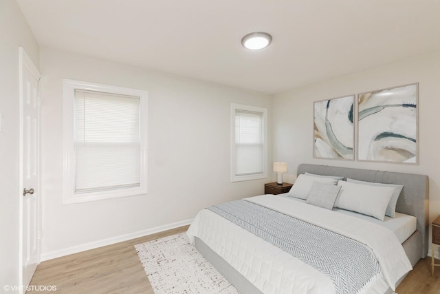 9811 S Woodlawn Ave, Chicago, IL 60628 - bedroom with light wood-style floors