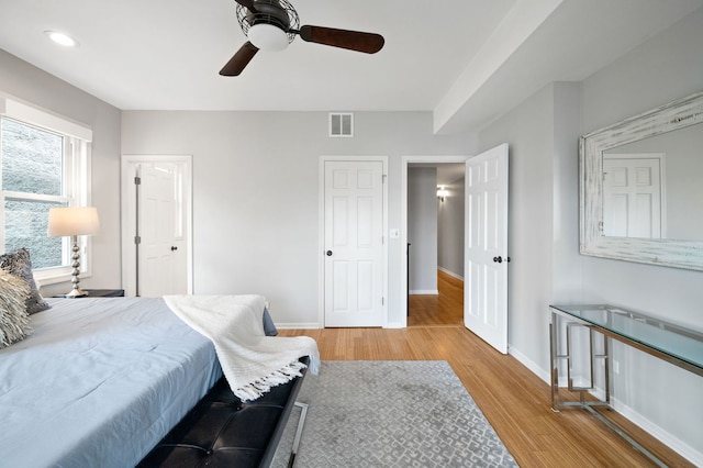 1242 W Ohio St Unit 2E, Chicago, IL 60642 - bedroom with wood finished floors, ceiling fan, and recessed lighting