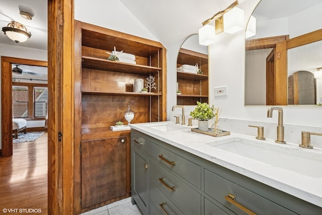 128 Coolidge Ave, Barrington, IL 60010 - ensuite bathroom featuring double vanity, vaulted ceiling, ceiling fan, and wood finished floors