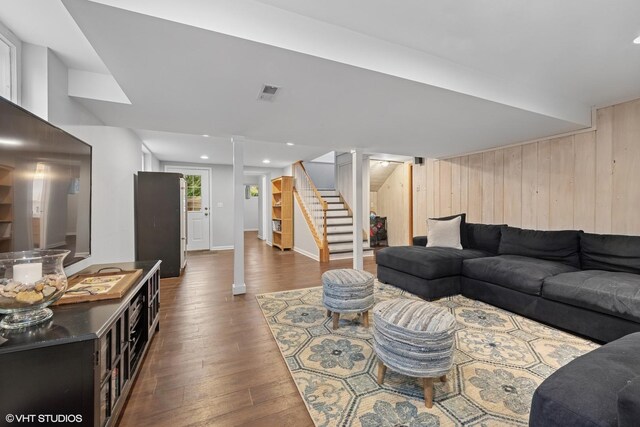128 Coolidge Ave, Barrington, IL 60010 - living area featuring wood walls, stairway, and dark wood-style floors