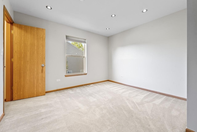 1018 Butterfield Cir E, Shorewood, IL 60404 - carpeted empty room featuring baseboards and recessed lighting