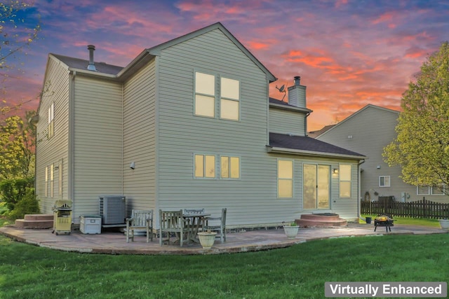 1018 Butterfield Cir E, Shorewood, IL 60404 - rear view of house featuring a patio area and a chimney