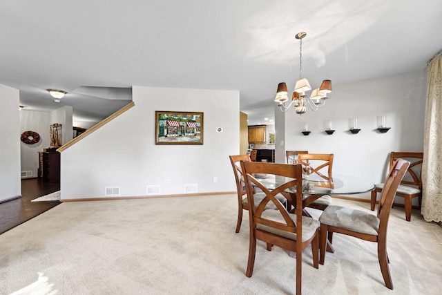 1018 Butterfield Cir E, Shorewood, IL 60404 - dining room featuring light colored carpet and a chandelier