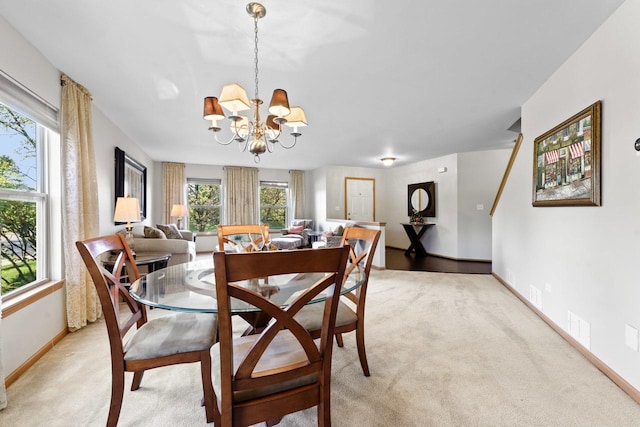 1018 Butterfield Cir E, Shorewood, IL 60404 - dining space with light colored carpet and a chandelier