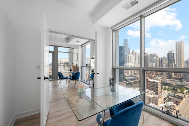 303 W Ohio St Unit 2302, Chicago, IL 60654 - dining room with a skyline view and wood finished floors
