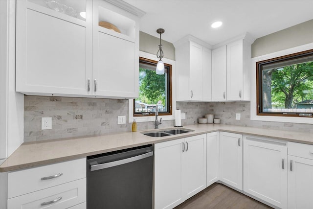 20 Park Dr, Villa Grove, IL 61956 - kitchen featuring dishwasher, white cabinets, decorative light fixtures, backsplash, and recessed lighting