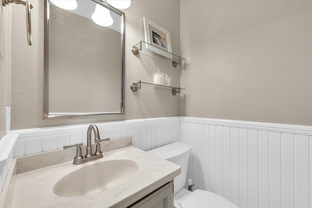 20 Park Dr, Villa Grove, IL 61956 - bathroom featuring a wainscoted wall and vanity