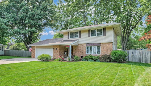 20 Park Dr, Villa Grove, IL 61956 - view of front facade with brick siding, driveway, and a garage