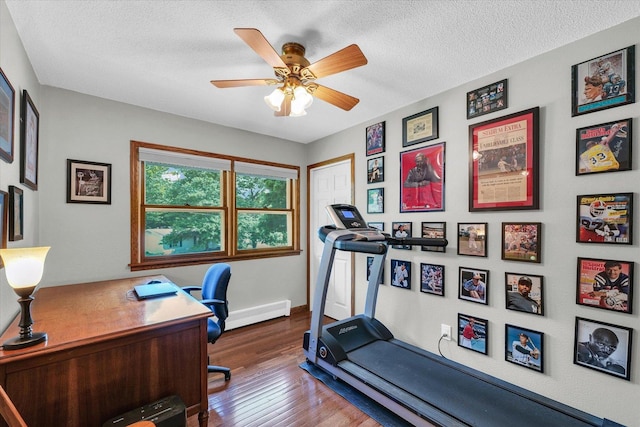 20 Park Dr, Villa Grove, IL 61956 - workout area with wood finished floors, a textured ceiling, and a ceiling fan