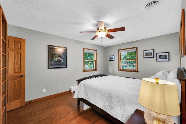 20 Park Dr, Villa Grove, IL 61956 - bedroom featuring wood finished floors and a ceiling fan
