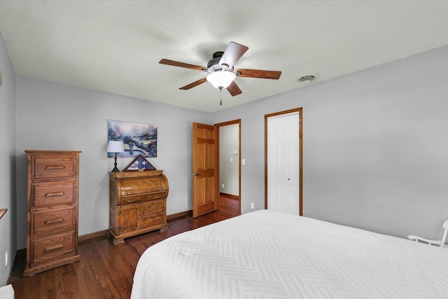 20 Park Dr, Villa Grove, IL 61956 - bedroom featuring dark wood-type flooring, ceiling fan, and a closet
