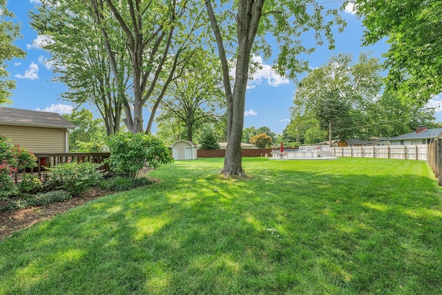 20 Park Dr, Villa Grove, IL 61956 - fenced backyard featuring a storage shed