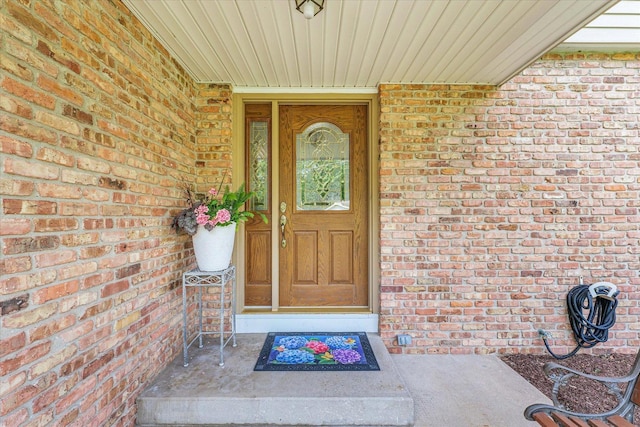 20 Park Dr, Villa Grove, IL 61956 - doorway to property with brick siding