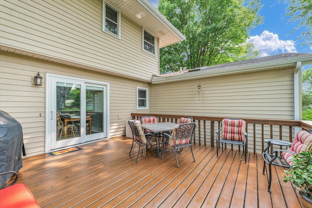 20 Park Dr, Villa Grove, IL 61956 - deck featuring outdoor dining area and grilling area