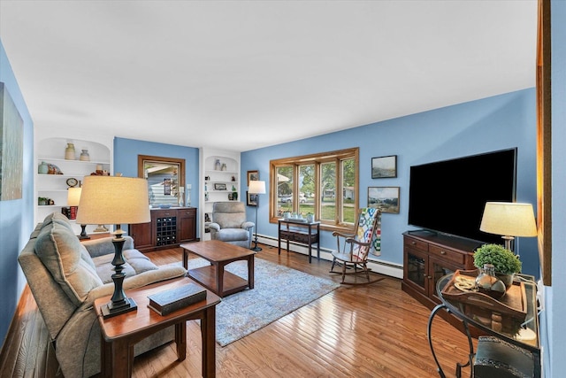 20 Park Dr, Villa Grove, IL 61956 - living room featuring built in features and wood finished floors
