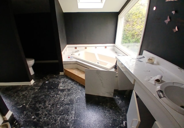 540 Homan Ave, Park Forest, IL 60466 - bathroom featuring a tub with jets and toilet