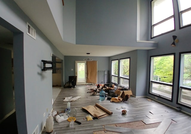 540 Homan Ave, Park Forest, IL 60466 - living room featuring wood finished floors and a towering ceiling