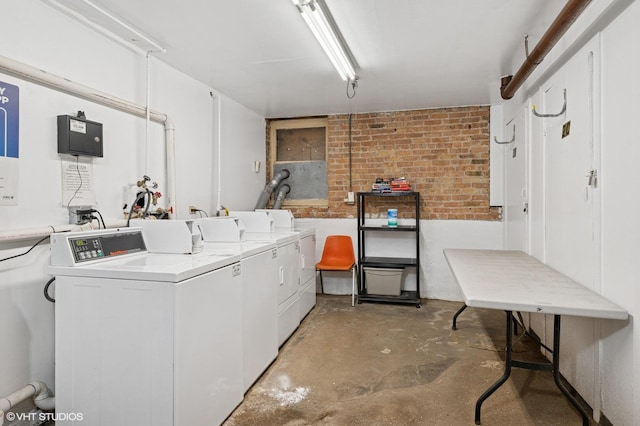 902 W Margate Ter Unit 2D, Chicago, IL 60640 - community laundry featuring washing machine and clothes dryer and brick wall