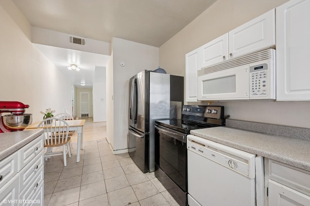 902 W Margate Ter Unit 2D, Chicago, IL 60640 - kitchen featuring white appliances, white cabinetry, and light countertops