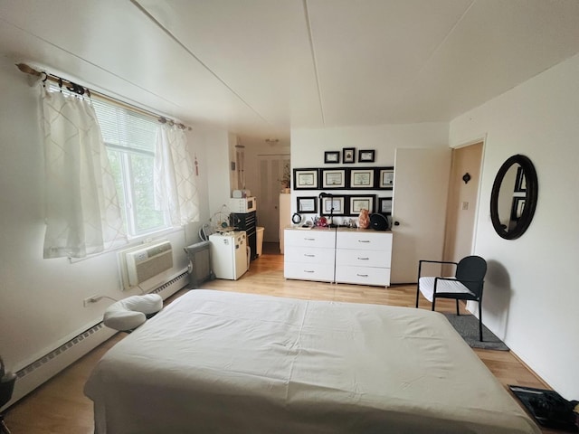 225 S Rohlwing Rd Unit 618, Palatine, IL 60074 - bedroom featuring an AC wall unit and light wood finished floors