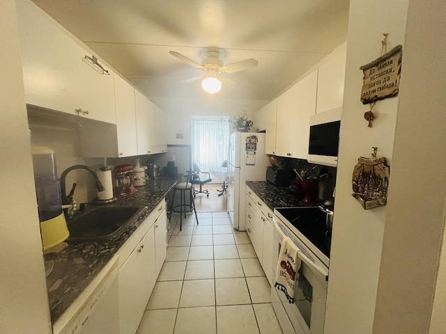225 S Rohlwing Rd Unit 618, Palatine, IL 60074 - kitchen with white appliances, light tile patterned flooring, white cabinets, and a ceiling fan