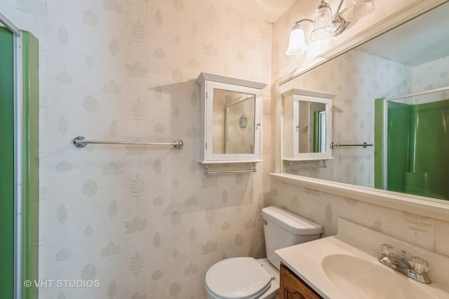 1954 Greenview St, Valparaiso, IN 46383 - full bathroom with vanity, an enclosed shower, and wallpapered walls