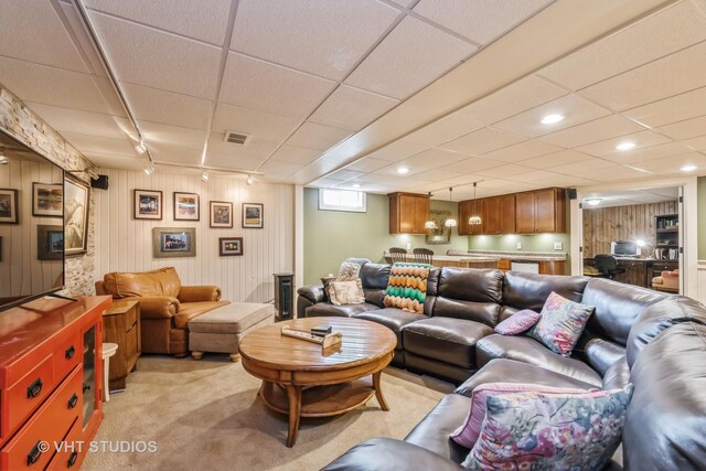 1954 Greenview St, Valparaiso, IN 46383 - living area with track lighting, light carpet, wooden walls, and recessed lighting