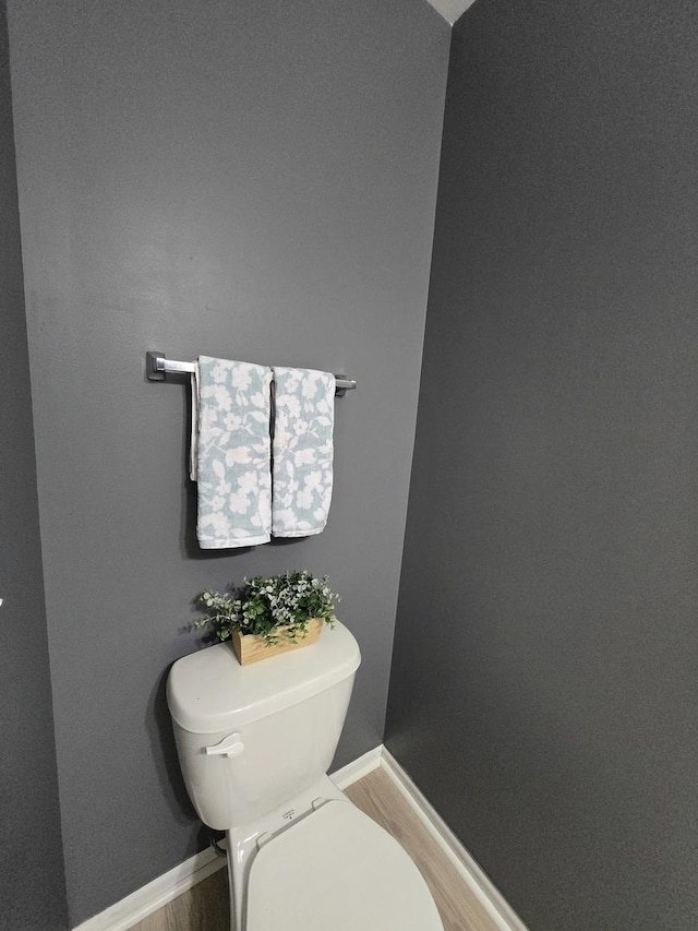 8501 Sawyer Ct, Joliet, IL 60431 - bathroom featuring wood finished floors and baseboards