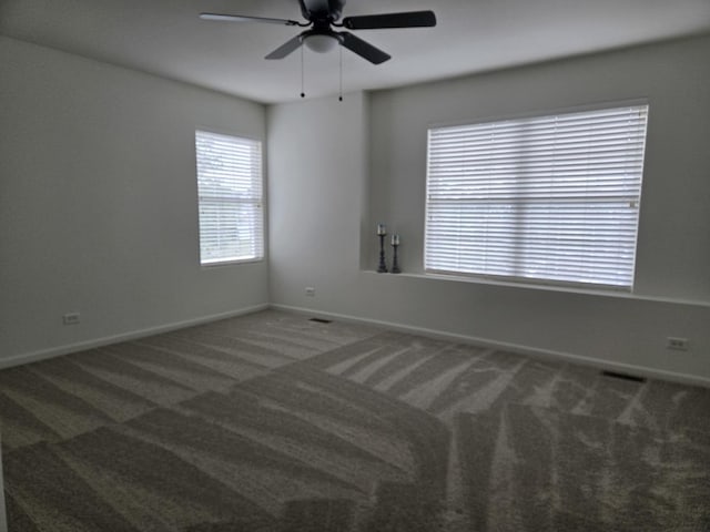 8501 Sawyer Ct, Joliet, IL 60431 - carpeted spare room featuring a ceiling fan and baseboards