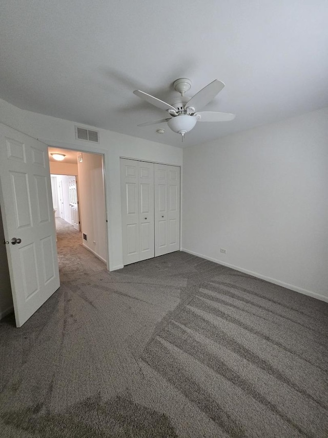 8501 Sawyer Ct, Joliet, IL 60431 - unfurnished bedroom with carpet, a closet, and a ceiling fan