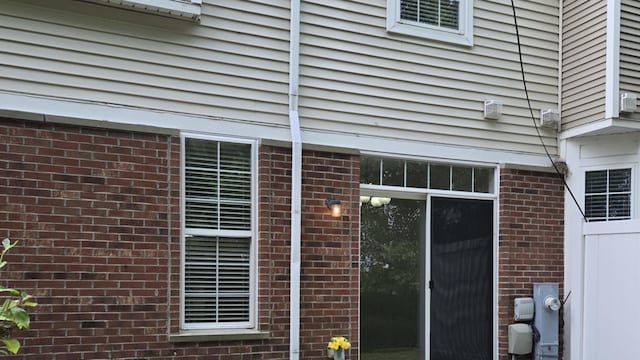 8501 Sawyer Ct, Joliet, IL 60431 - doorway to property featuring brick siding