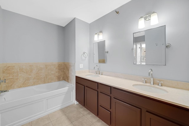 1600 S Prairie Ave Unit 1507, Chicago, IL 60616 - bathroom with tile patterned floors, double vanity, and a bath