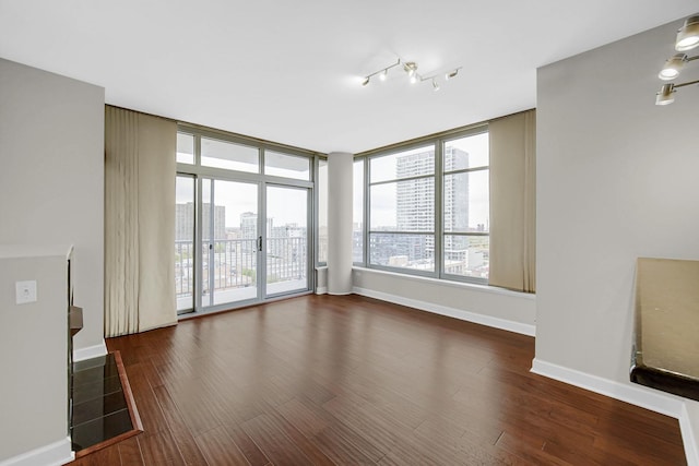 1600 S Prairie Ave Unit 1507, Chicago, IL 60616 - empty room with wood finished floors and a view of city