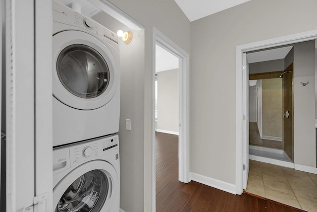 1600 S Prairie Ave Unit 1507, Chicago, IL 60616 - laundry area with stacked washer / drying machine and dark wood-style flooring