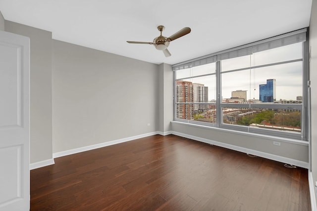 1600 S Prairie Ave Unit 1507, Chicago, IL 60616 - spare room with ceiling fan, wood finished floors, and a city view