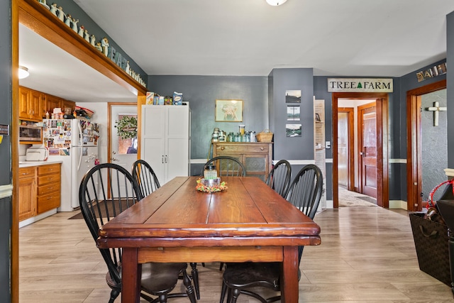 2070 County Road 2400, Thomasboro, IL 61878 - dining room featuring light wood-style flooring