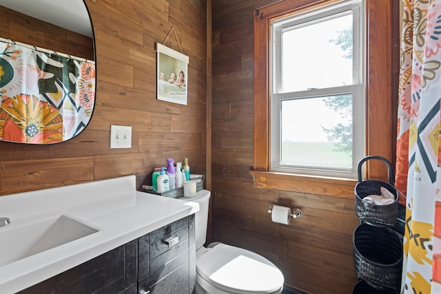 2070 County Road 2400, Thomasboro, IL 61878 - full bathroom with wooden walls, plenty of natural light, vanity, and a shower with curtain