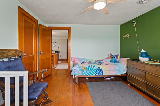 2070 County Road 2400, Thomasboro, IL 61878 - bedroom featuring wood finished floors and ceiling fan