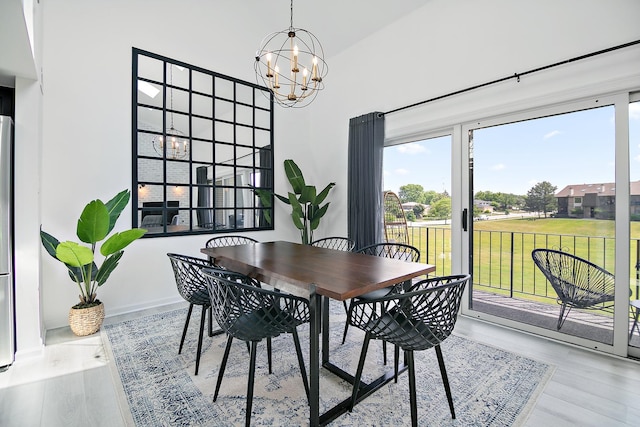 15705 Lake Hills Ct Unit 2N, Orland Park, IL 60462 - dining area featuring a chandelier and wood finished floors