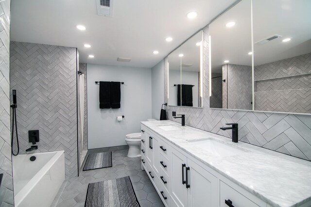 15705 Lake Hills Ct Unit 2N, Orland Park, IL 60462 - bathroom featuring double vanity, a bathtub, a shower, recessed lighting, and tile patterned floors