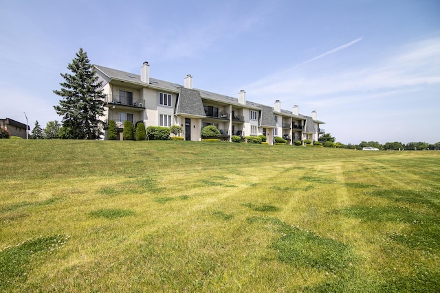 15705 Lake Hills Ct Unit 2N, Orland Park, IL 60462 - back of property featuring a lawn