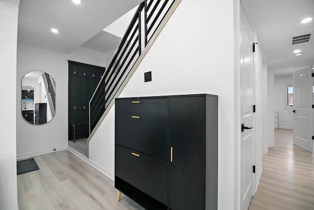 15705 Lake Hills Ct Unit 2N, Orland Park, IL 60462 - hallway featuring light wood-style floors, stairway, and recessed lighting