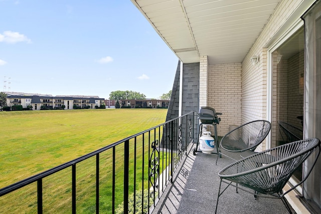 15705 Lake Hills Ct Unit 2N, Orland Park, IL 60462 - balcony featuring a grill