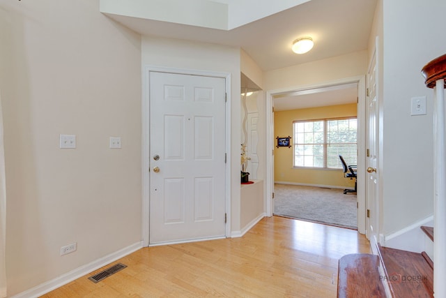 911 Waterford Ln, Elk Grove Village, IL 60007 - entrance foyer featuring light wood-style floors and baseboards
